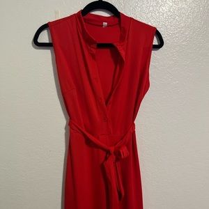 Red Button Up Jumpsuit. Size: Medium. Can fit small. NEVER WORN